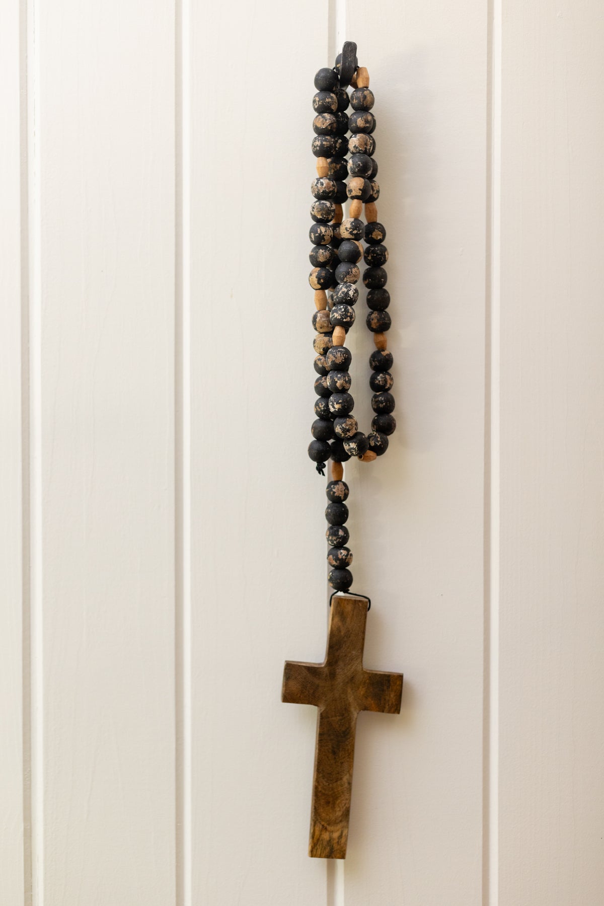 ***Cross on Antiqued Black Wood Bead Strand