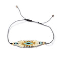Silver & Gold Patterned Beaded Bracelet